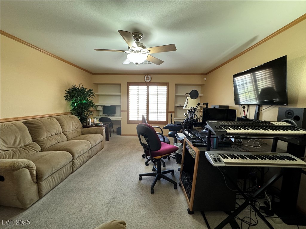 420 Rhythm Street Henderson, NV 89074 - Photo 19 of 27 Office space featuring ornamental molding, light carpet, and a ceiling fan