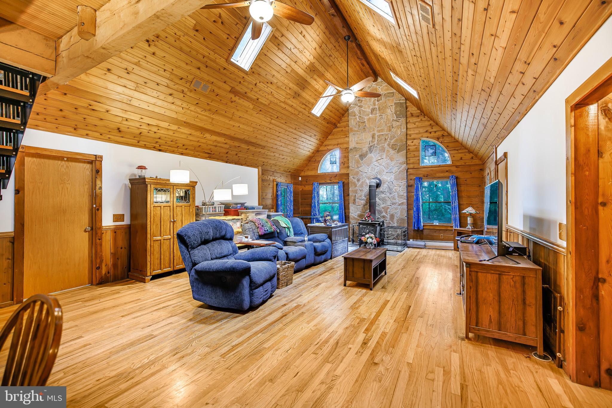 Great Room with cathedral ceiling and skylights