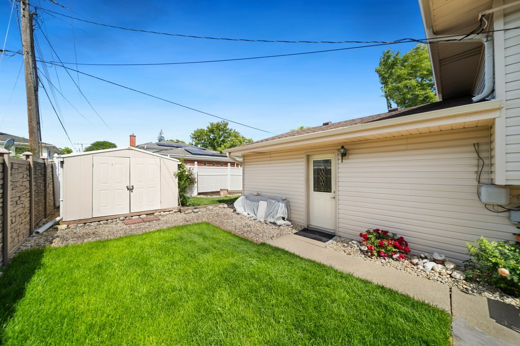 365 West Myrick Avenue Addison, IL 60101 - Photo 30 of 49 a view of a backyard with potted plants