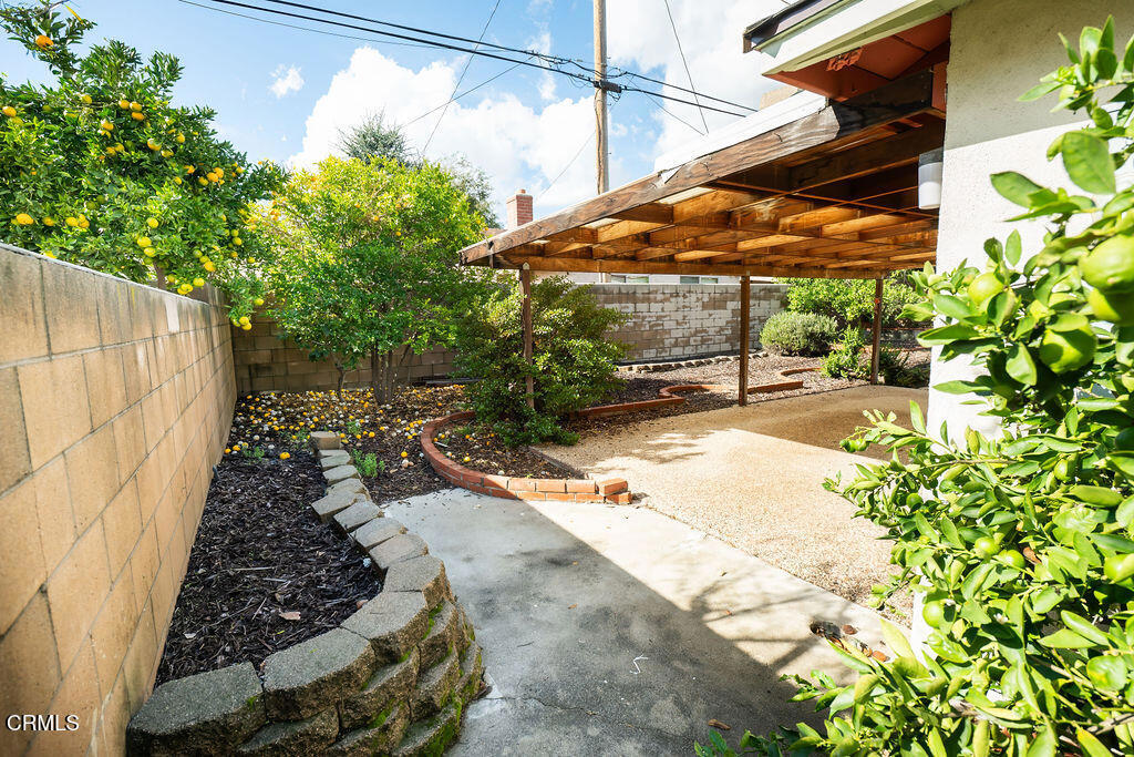 691 Springfield Avenue Ventura, CA 93004 - Photo 24 of 30 a view of a backyard with a patio