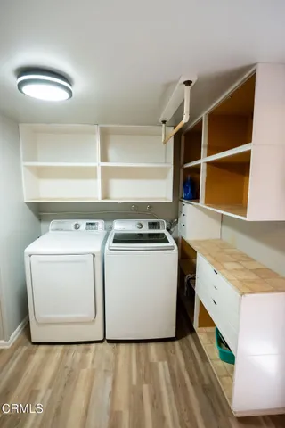 a utility room with washer and dryer