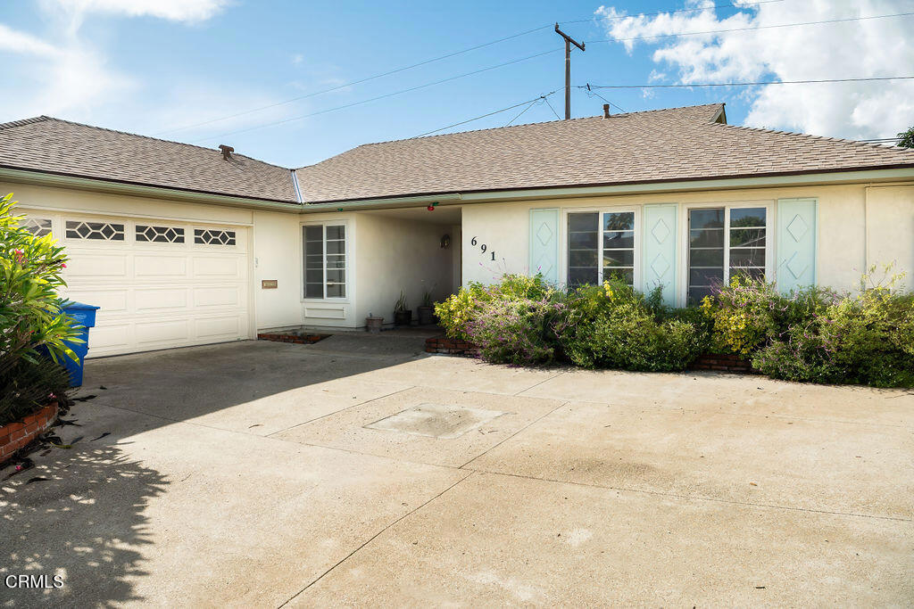 691 Springfield Avenue Ventura, CA 93004 - Photo 3 of 30 a view of a house with potted plants