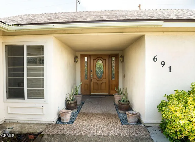 a view of entrance gate of the house