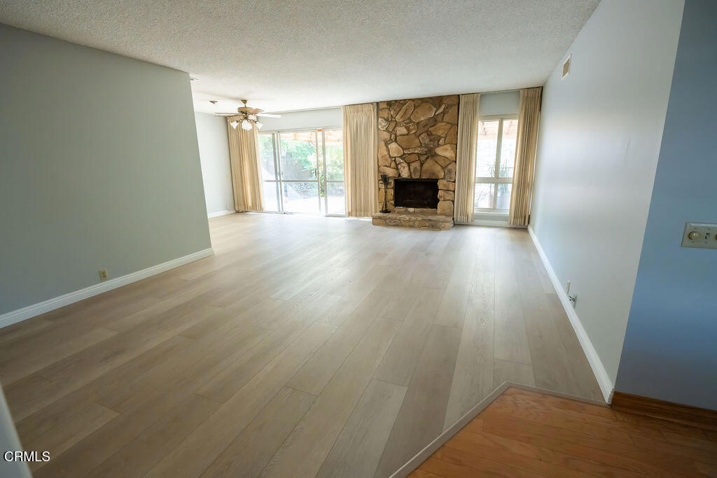 691 Springfield Avenue Ventura, CA 93004 - Photo 5 of 30 wooden floor in an empty room with a window