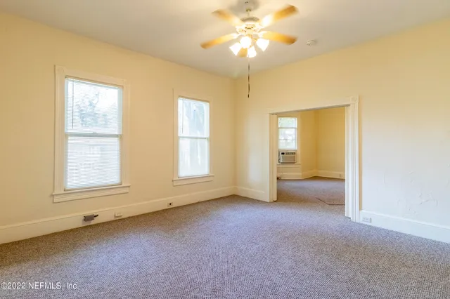 a kitchen with a stove a refrigerator and a stove