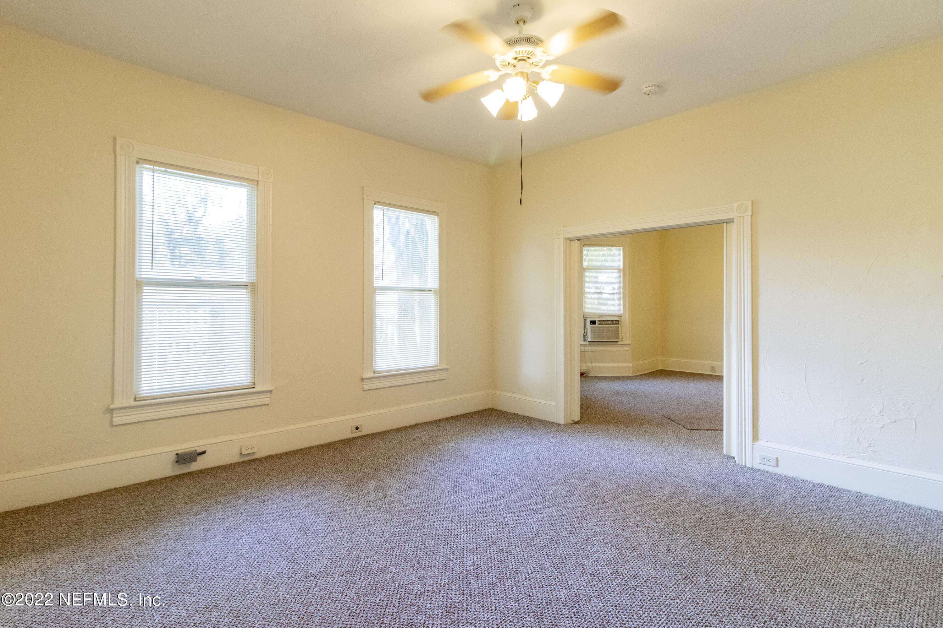 24 Riberia Street, Unit B St. Augustine, FL 32084 - Photo 13 of 19 a view of an empty room with a window