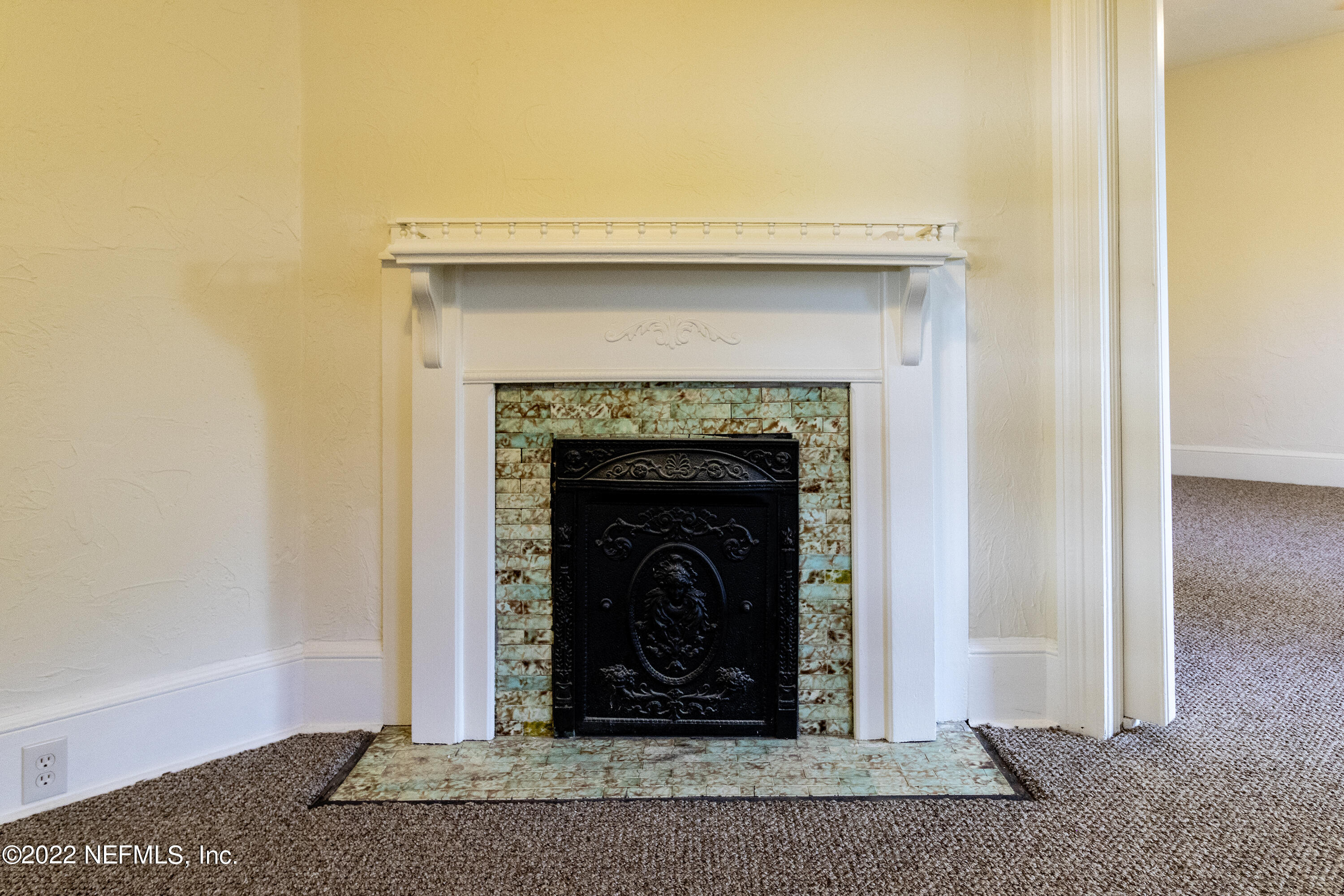 24 Riberia Street, Unit B St. Augustine, FL 32084 - Photo 4 of 19 a close view of a fireplace