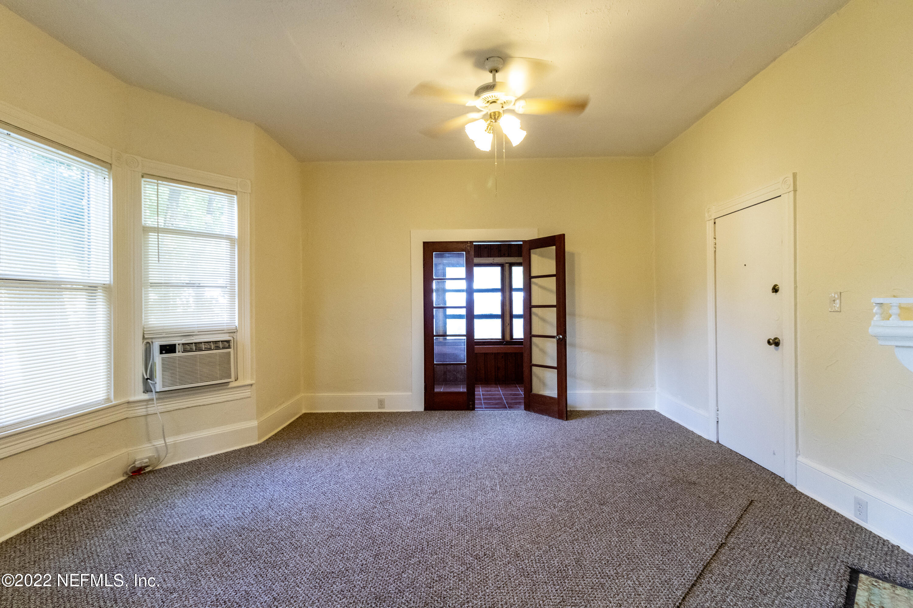 24 Riberia Street, Unit B St. Augustine, FL 32084 - Photo 7 of 19 a view of an empty room with a window