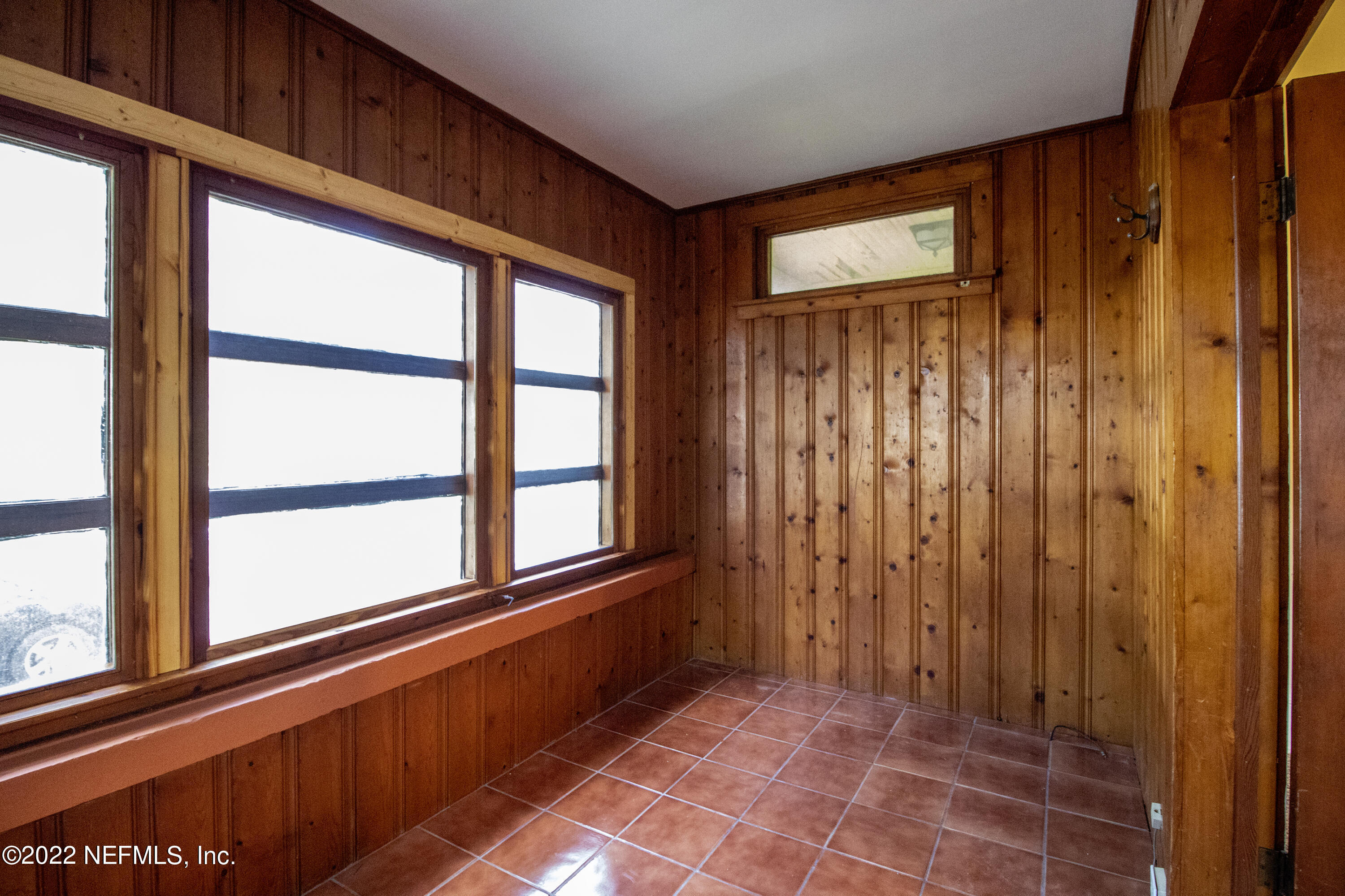24 Riberia Street, Unit B St. Augustine, FL 32084 - Photo 8 of 19 a view of a door and wooden floor