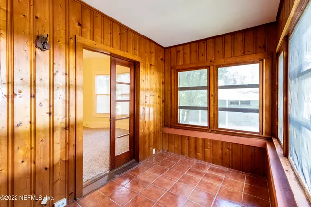a view of a bathroom with a shower curtain