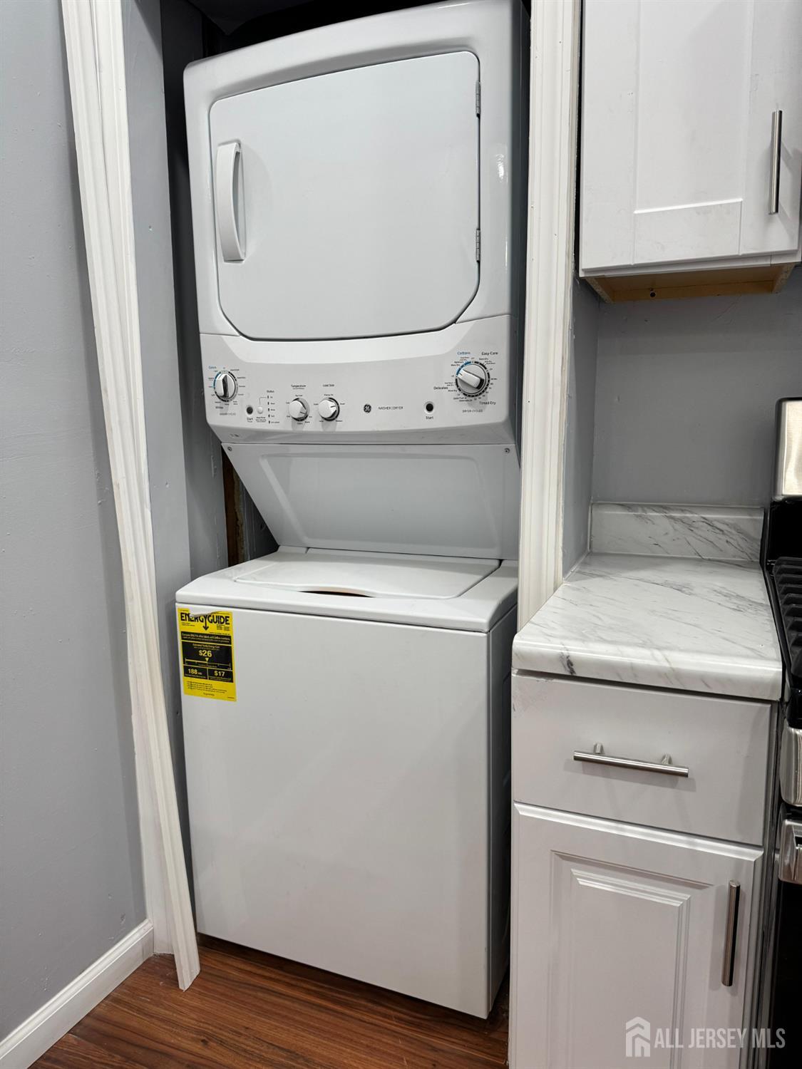 51 Poe Avenue, Unit 3 Newark, NJ 07106 - Photo 12 of 14 a utility room with dryer and washer