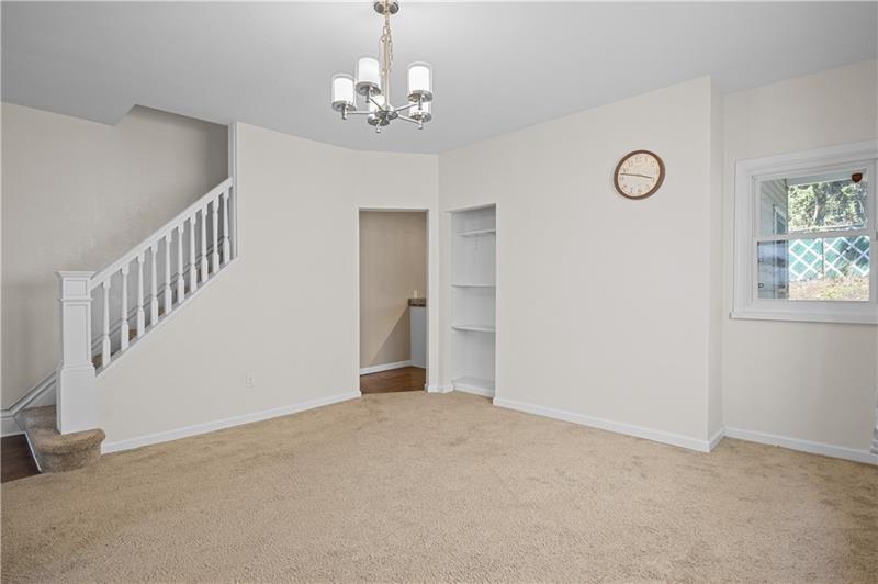 246 Dunseith Street Pittsburgh, PA 15213 - Photo 11 of 28 a view of an empty room with wooden floor