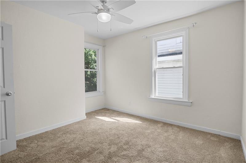 246 Dunseith Street Pittsburgh, PA 15213 - Photo 19 of 28 an empty room with a window