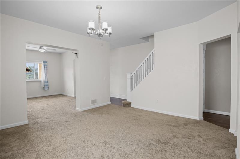 246 Dunseith Street Pittsburgh, PA 15213 - Photo 10 of 28 a view of an empty room with wooden floor