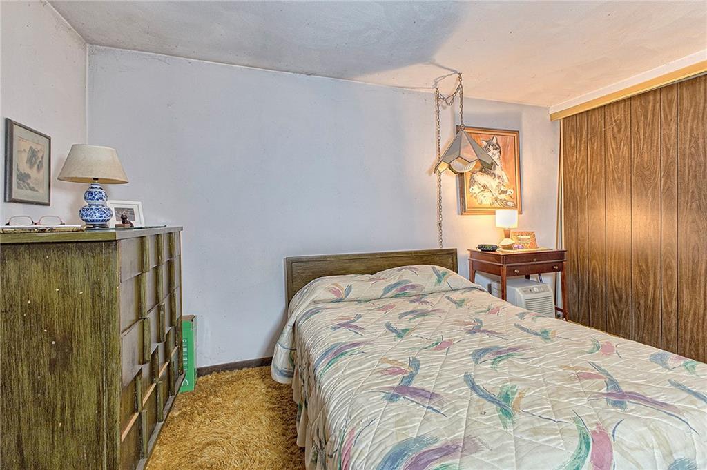 128 Raccoon Road, Unit ACME PA 15610 Acme, PA 15610 - Photo 13 of 23 a bedroom with a bed and a window