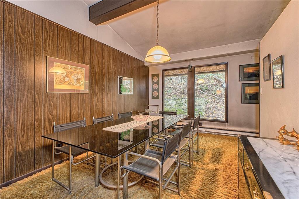 128 Raccoon Road, Unit ACME PA 15610 Acme, PA 15610 - Photo 5 of 23 a dining room with a table and chairs
