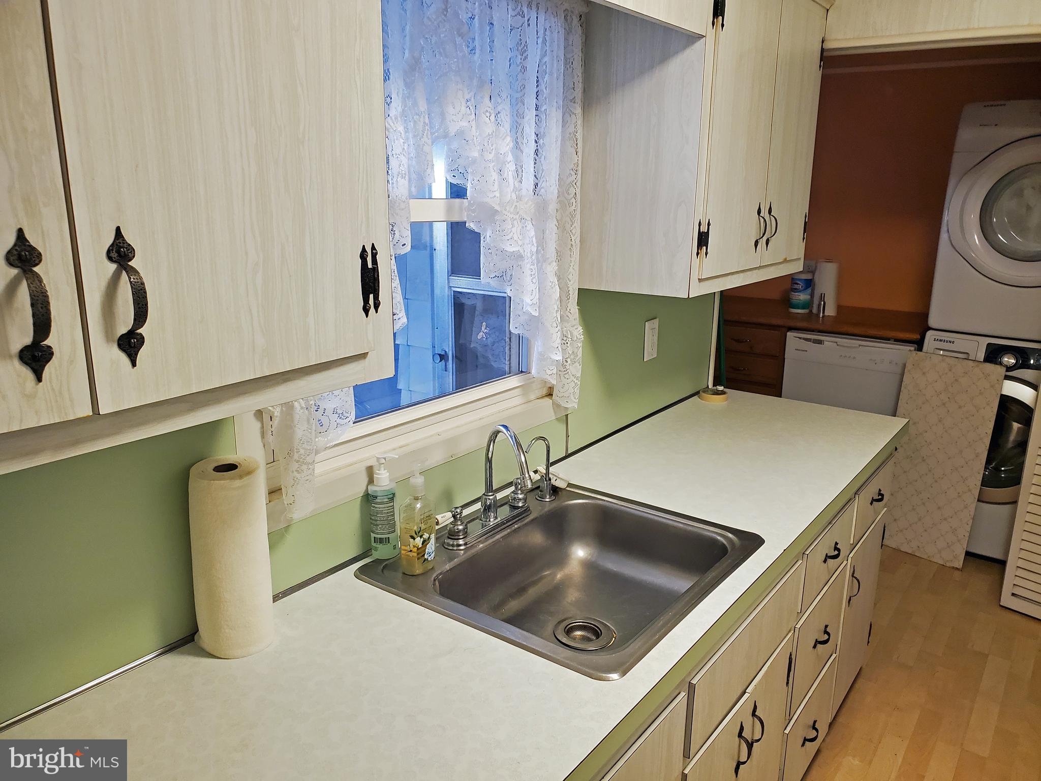 811 Centerville Road Wilmington, DE 19804 - Photo 4 of 14 Galley kitchen with stainless steel sink