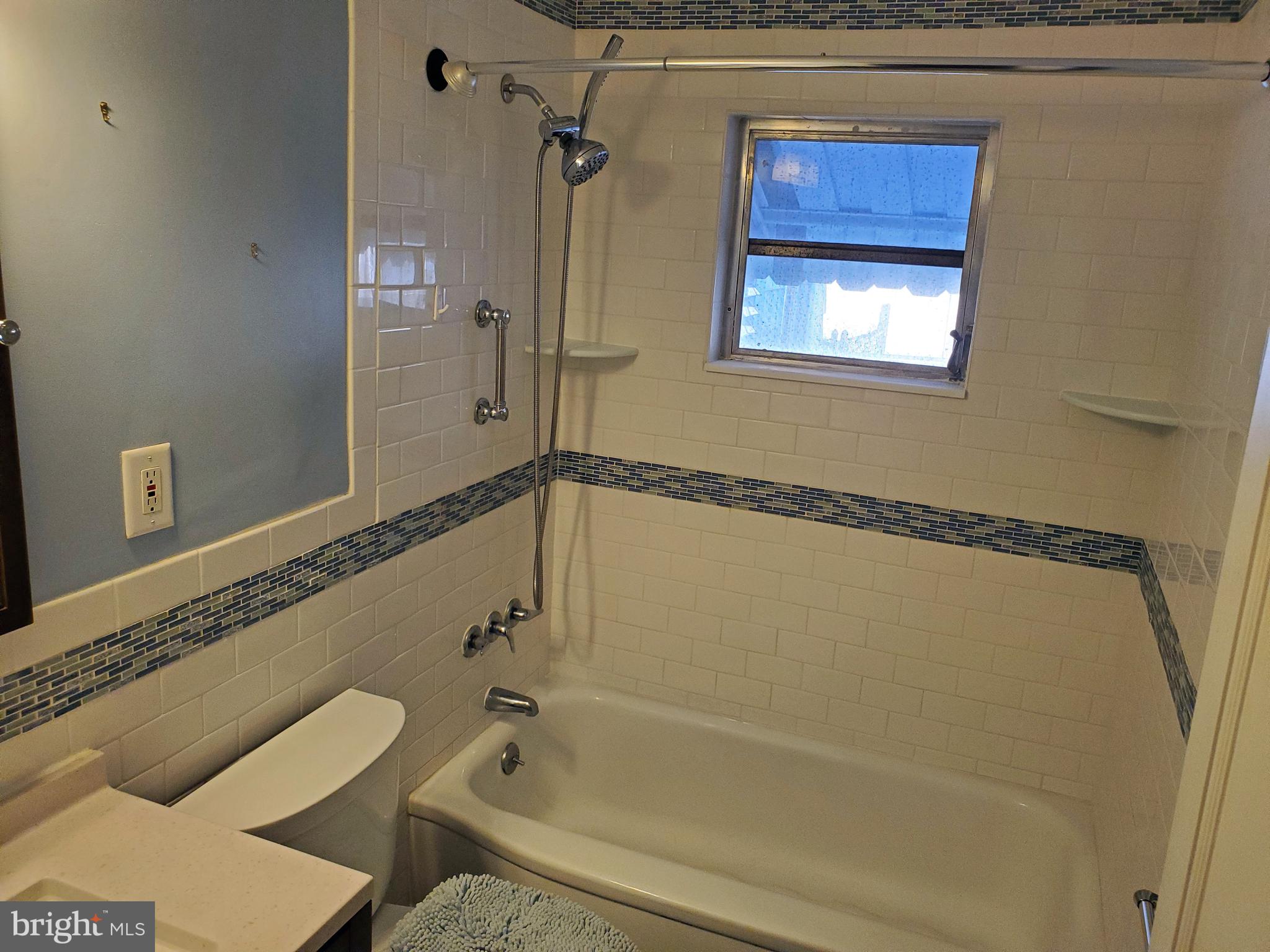 811 Centerville Road Wilmington, DE 19804 - Photo 10 of 14 Updated bath with tile floor and tub surround
