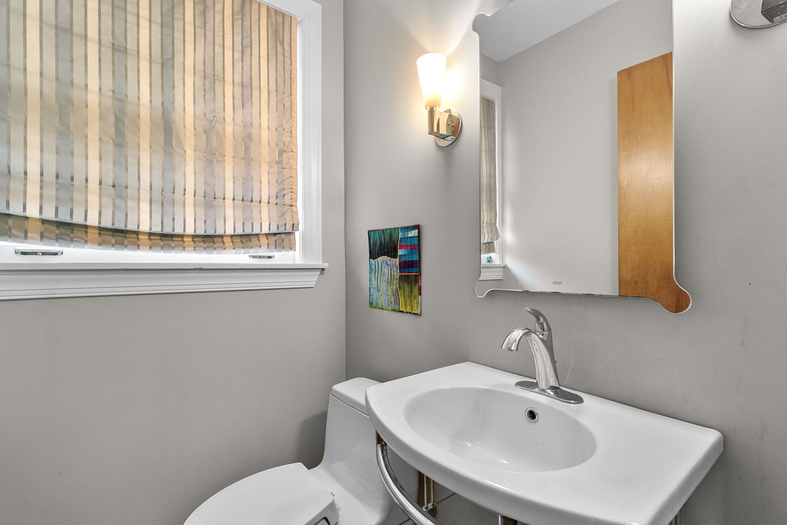 463 Longcommon Road Riverside, IL 60546 - Photo 12 of 36 a bathroom with a sink and a toilet