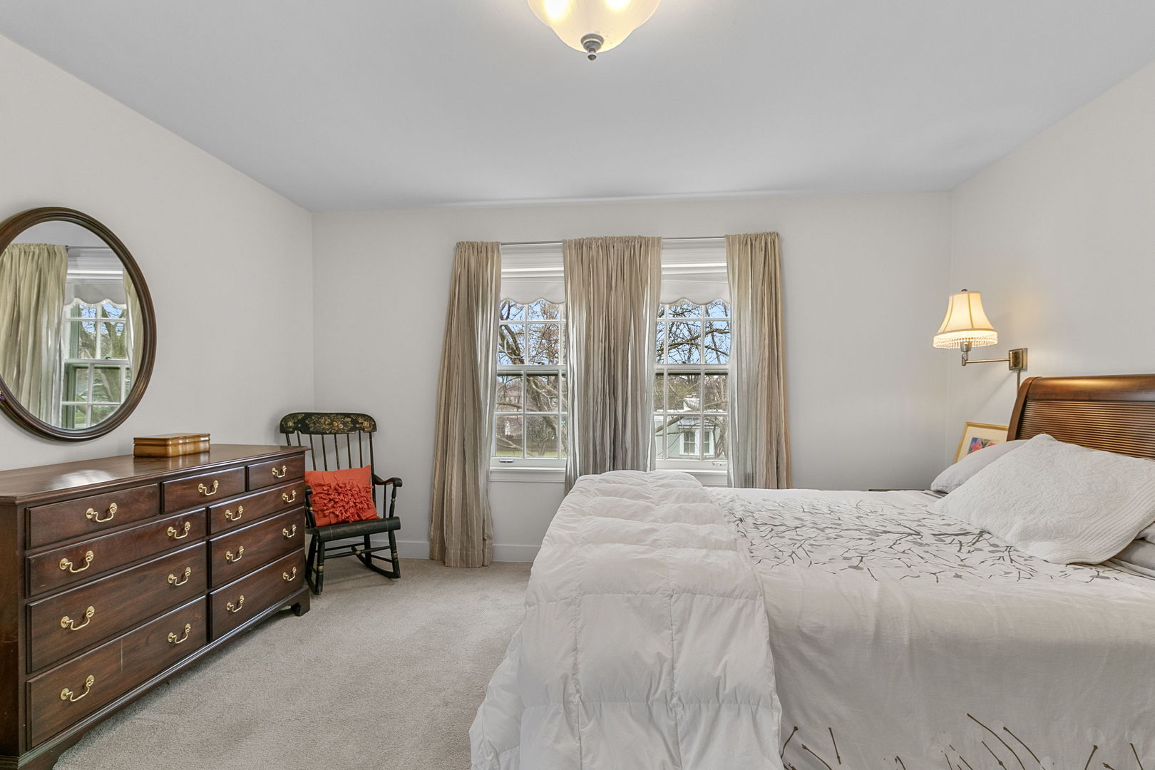 463 Longcommon Road Riverside, IL 60546 - Photo 14 of 36 a bedroom with a bed and a chandelier