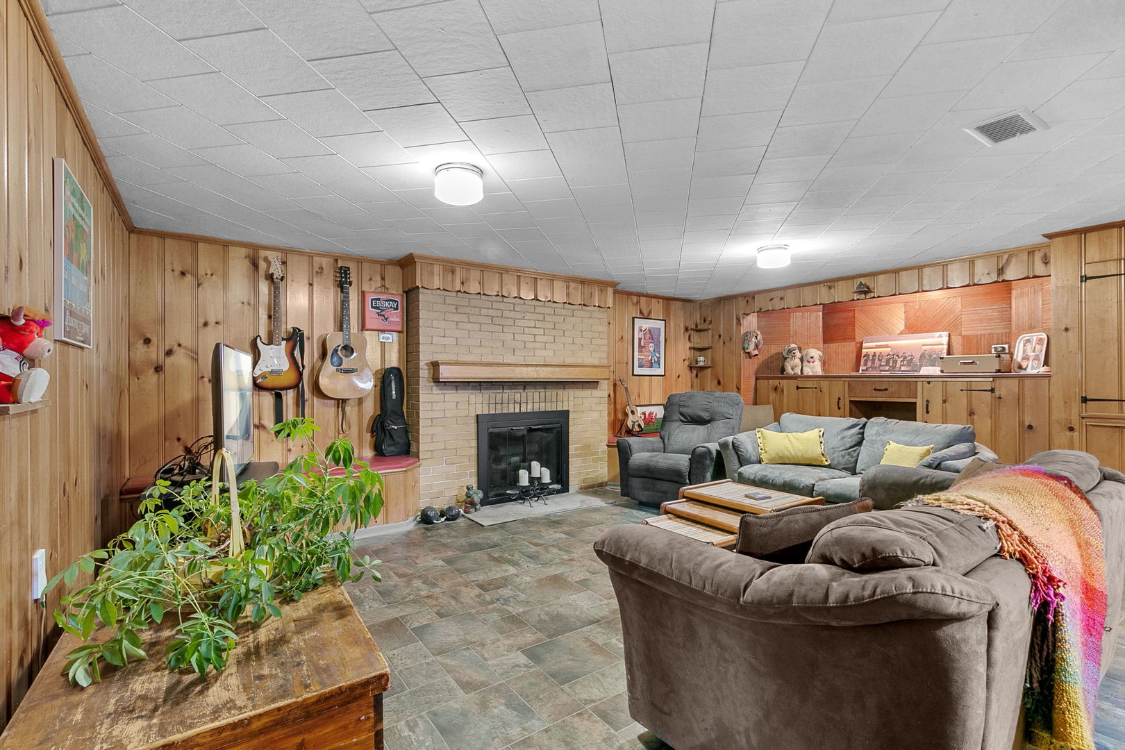 463 Longcommon Road Riverside, IL 60546 - Photo 19 of 36 a living room with furniture and a fireplace