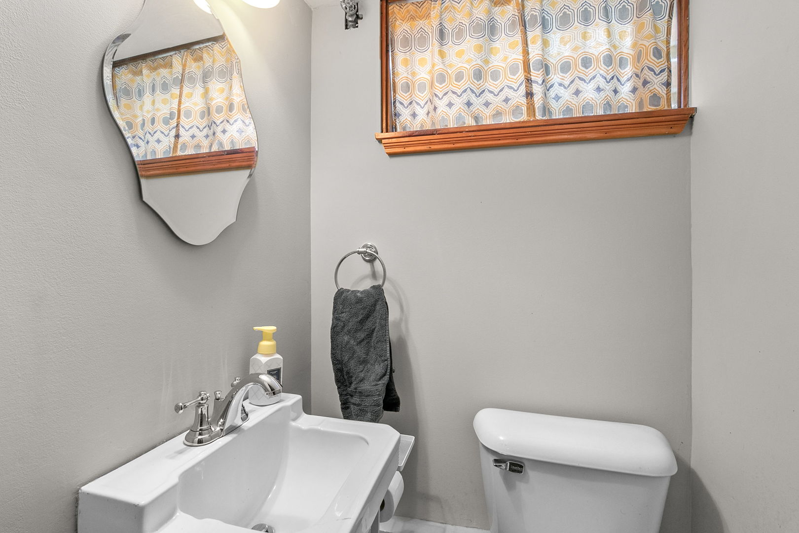 463 Longcommon Road Riverside, IL 60546 - Photo 22 of 36 a bathroom with a toilet sink and mirror