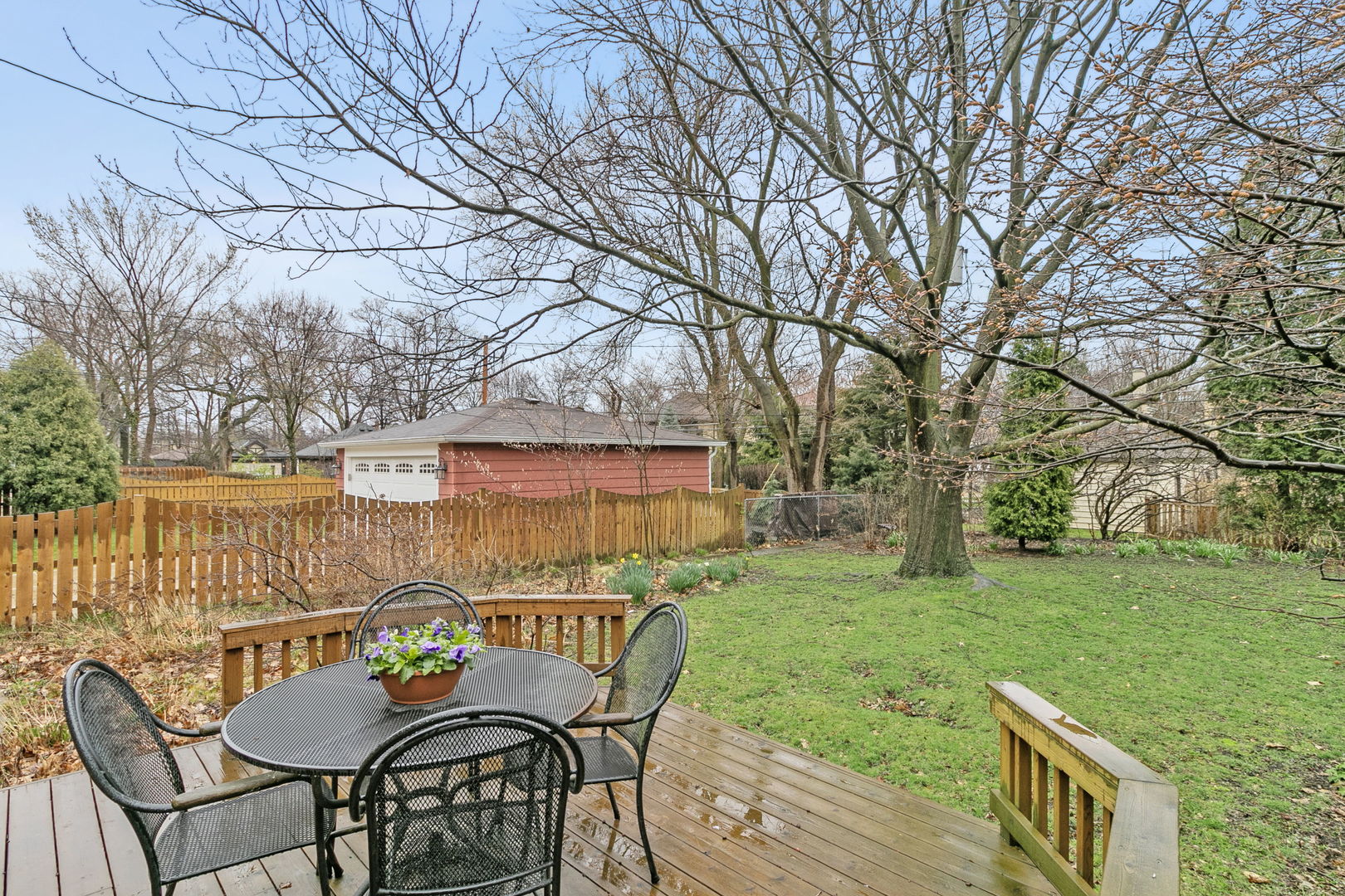 463 Longcommon Road Riverside, IL 60546 - Photo 24 of 36 a view of a chair and table on the deck
