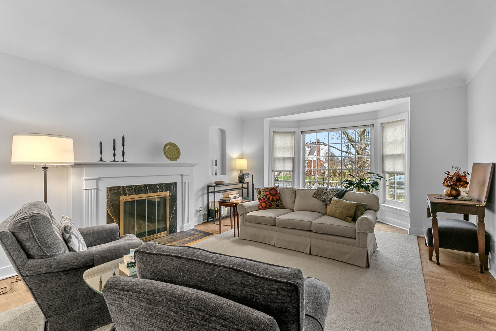 463 Longcommon Road Riverside, IL 60546 - Photo 3 of 36 a living room with furniture and a fireplace