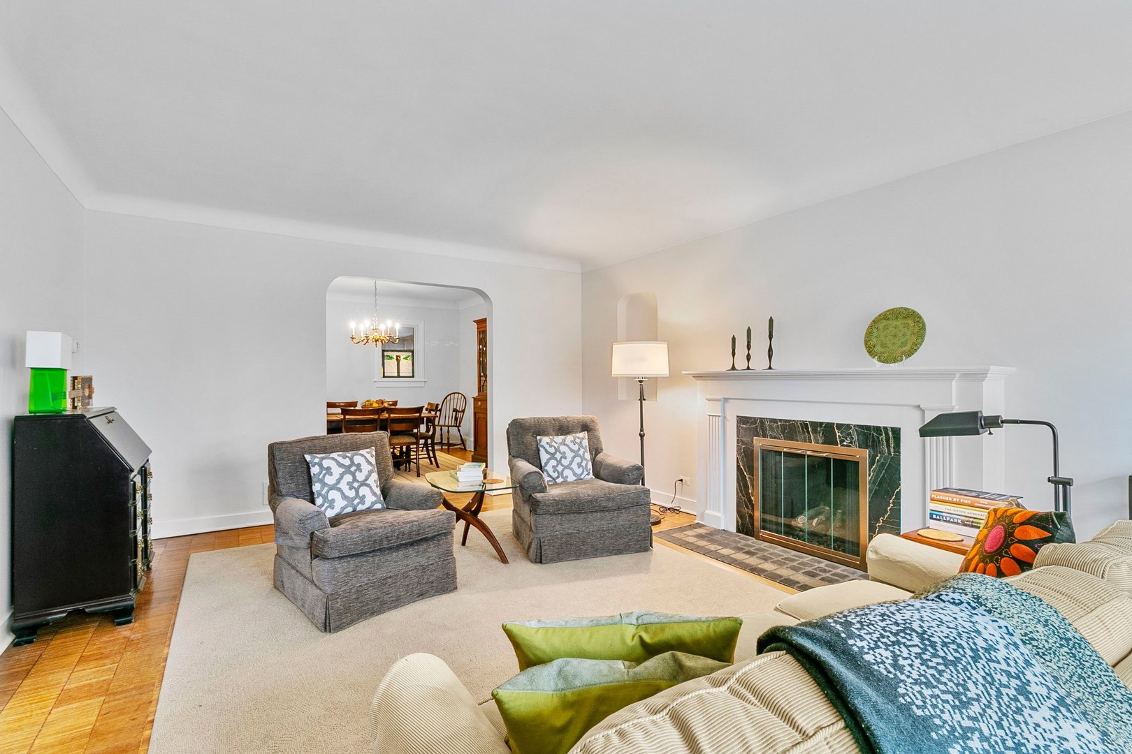 463 Longcommon Road Riverside, IL 60546 - Photo 4 of 36 a living room with furniture and a fireplace