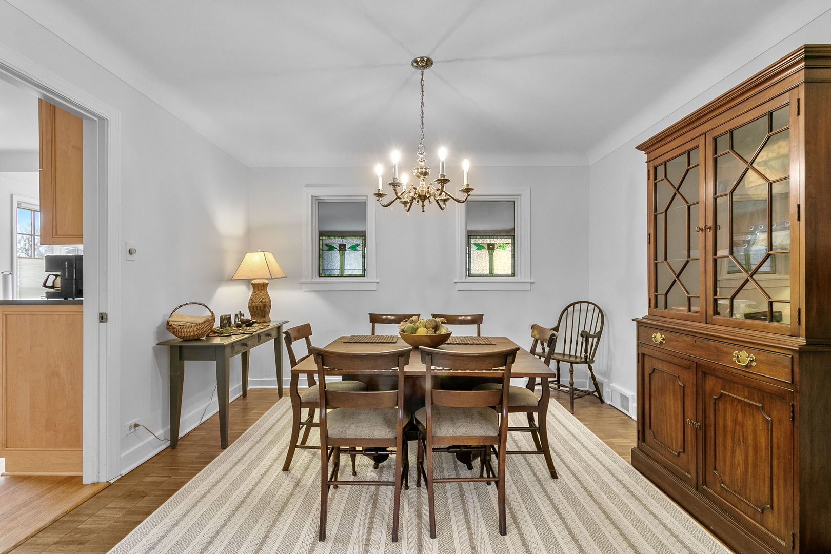 463 Longcommon Road Riverside, IL 60546 - Photo 5 of 36 a view of a dining room with furniture a chandelier and wooden floor