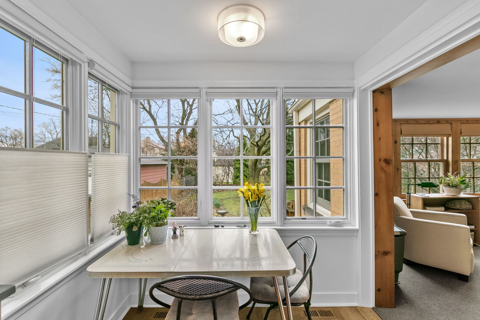 463 Longcommon Road Riverside, IL 60546 - Photo 10 of 36 a view of a dining room with furniture window and wooden floor