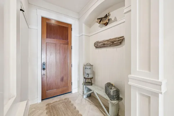 a kitchen with stainless steel appliances kitchen island granite countertop a sink and cabinets