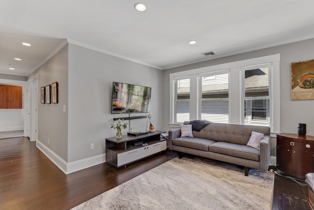7-9 Goodway Road, Unit 2 Boston, MA 02130 - Photo 11 of 33 a living room with furniture and a window
