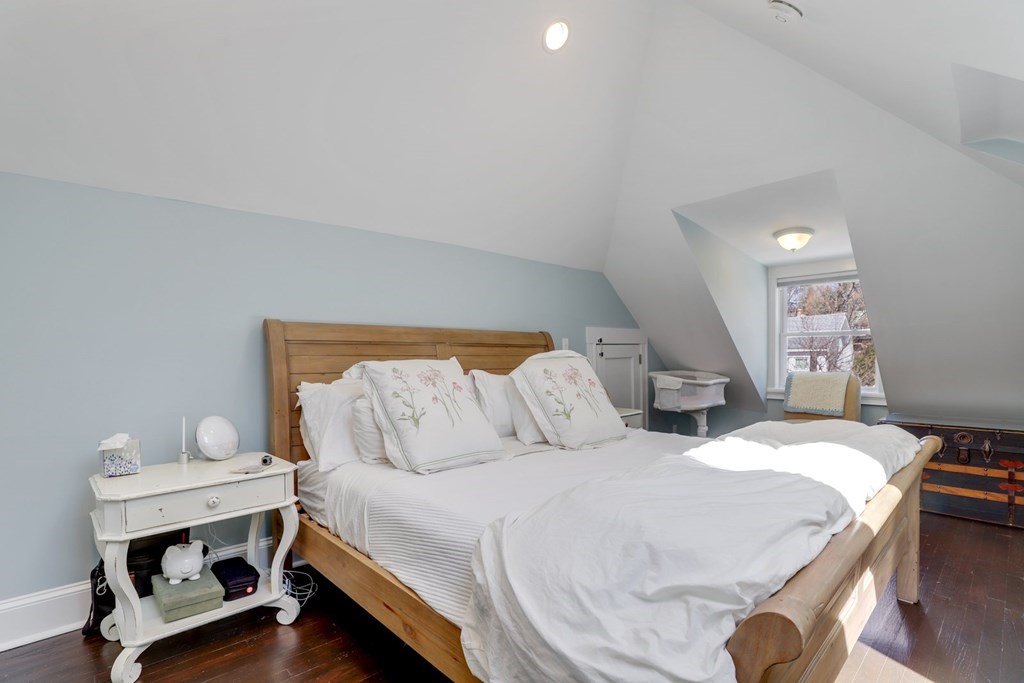 7-9 Goodway Road, Unit 2 Boston, MA 02130 - Photo 25 of 33 a bedroom with a bed and a potted plant