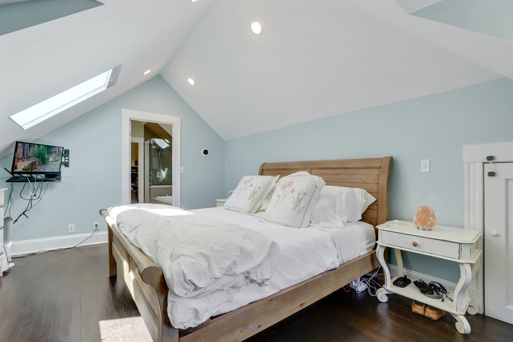 7-9 Goodway Road, Unit 2 Boston, MA 02130 - Photo 26 of 33 a bedroom with a bed and a table in it