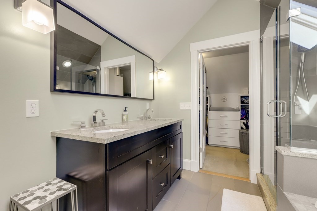 7-9 Goodway Road, Unit 2 Boston, MA 02130 - Photo 27 of 33 a bathroom with a sink a toilet and shower