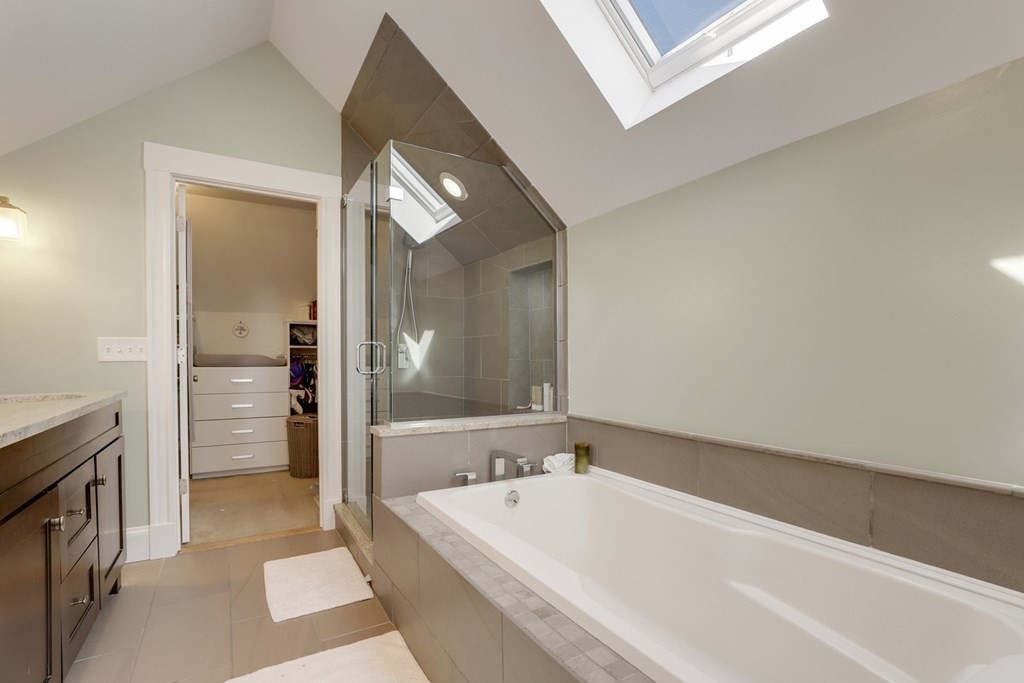 7-9 Goodway Road, Unit 2 Boston, MA 02130 - Photo 28 of 33 a bathroom with a bathtub and a sink