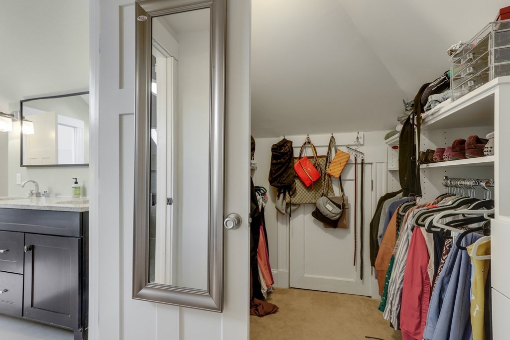 7-9 Goodway Road, Unit 2 Boston, MA 02130 - Photo 29 of 33 a view of walk in closet with clothes