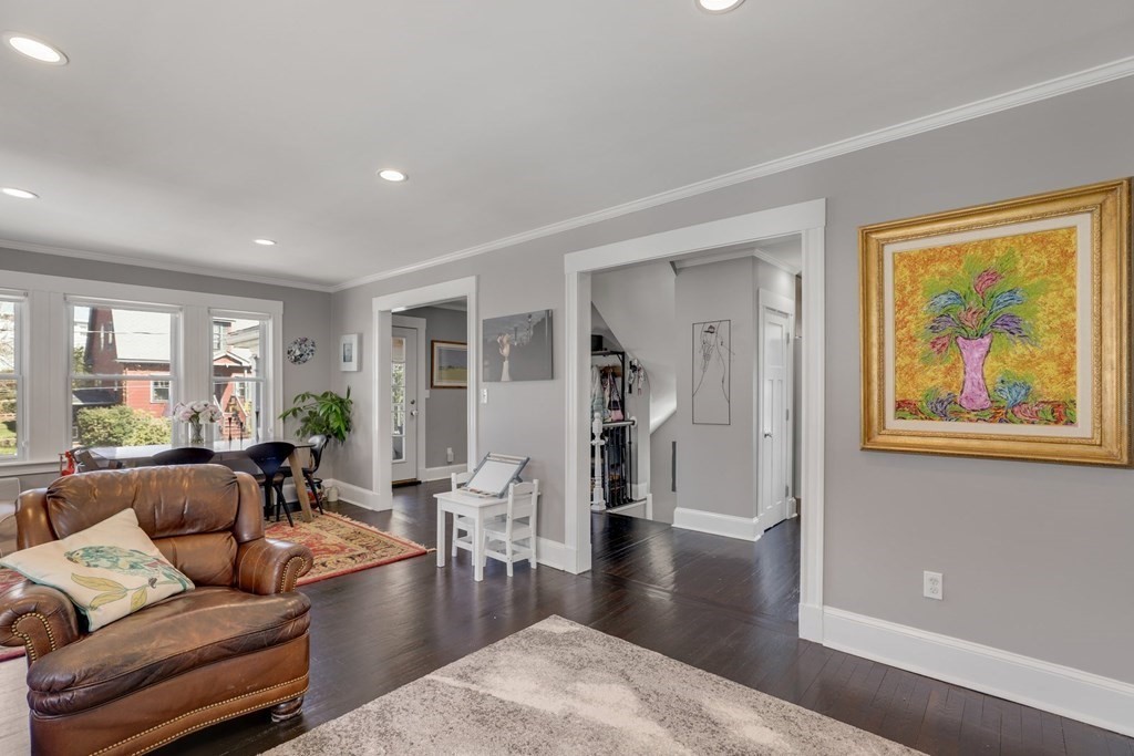 7-9 Goodway Road, Unit 2 Boston, MA 02130 - Photo 9 of 33 a living room with furniture and a gate