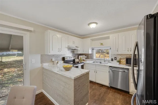 $185,000 | 2411 Dordogne Drive, Maryland Heights, MO 63043