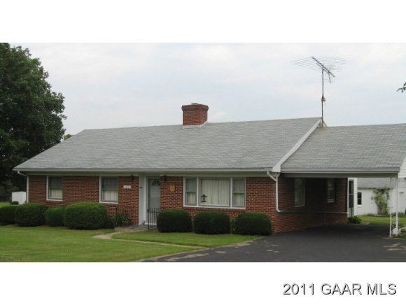 1813 Barrenridge Road Staunton, VA 24401 - Photo 1 of 18 a front view of a house with a garden