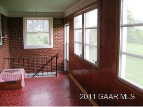 1813 Barrenridge Road Staunton, VA 24401 - Photo 4 of 18 a view of an empty room with a window