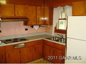 1813 Barrenridge Road Staunton, VA 24401 - Photo 6 of 18 a kitchen with granite countertop a sink and a stove