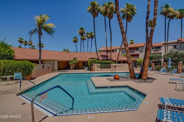 an aerial view of a house with swimming pool
