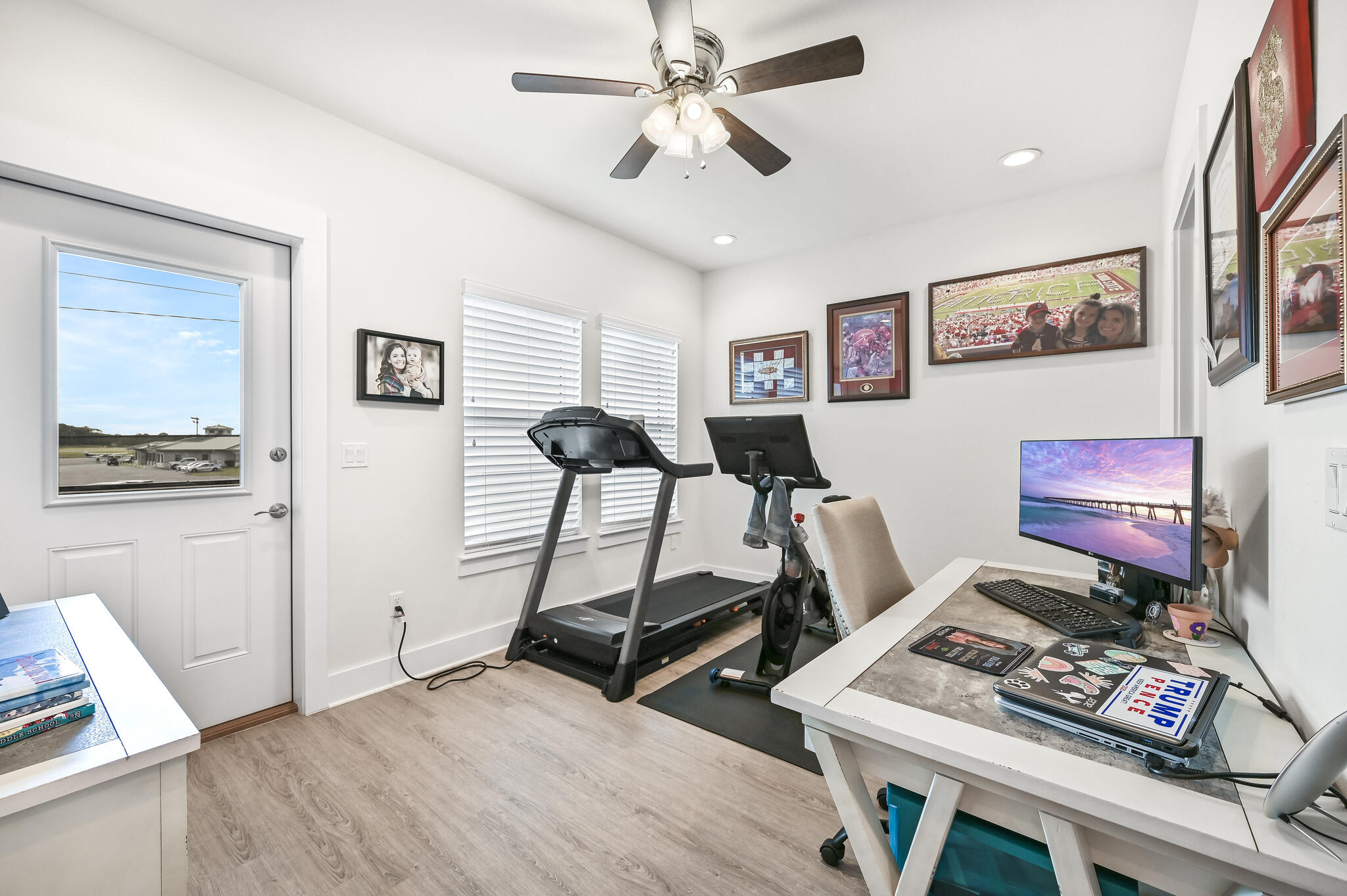 995 Airport Road, Unit 13 Destin, FL 32541 - Photo 20 of 34 a bedroom with furniture and a wooden floor