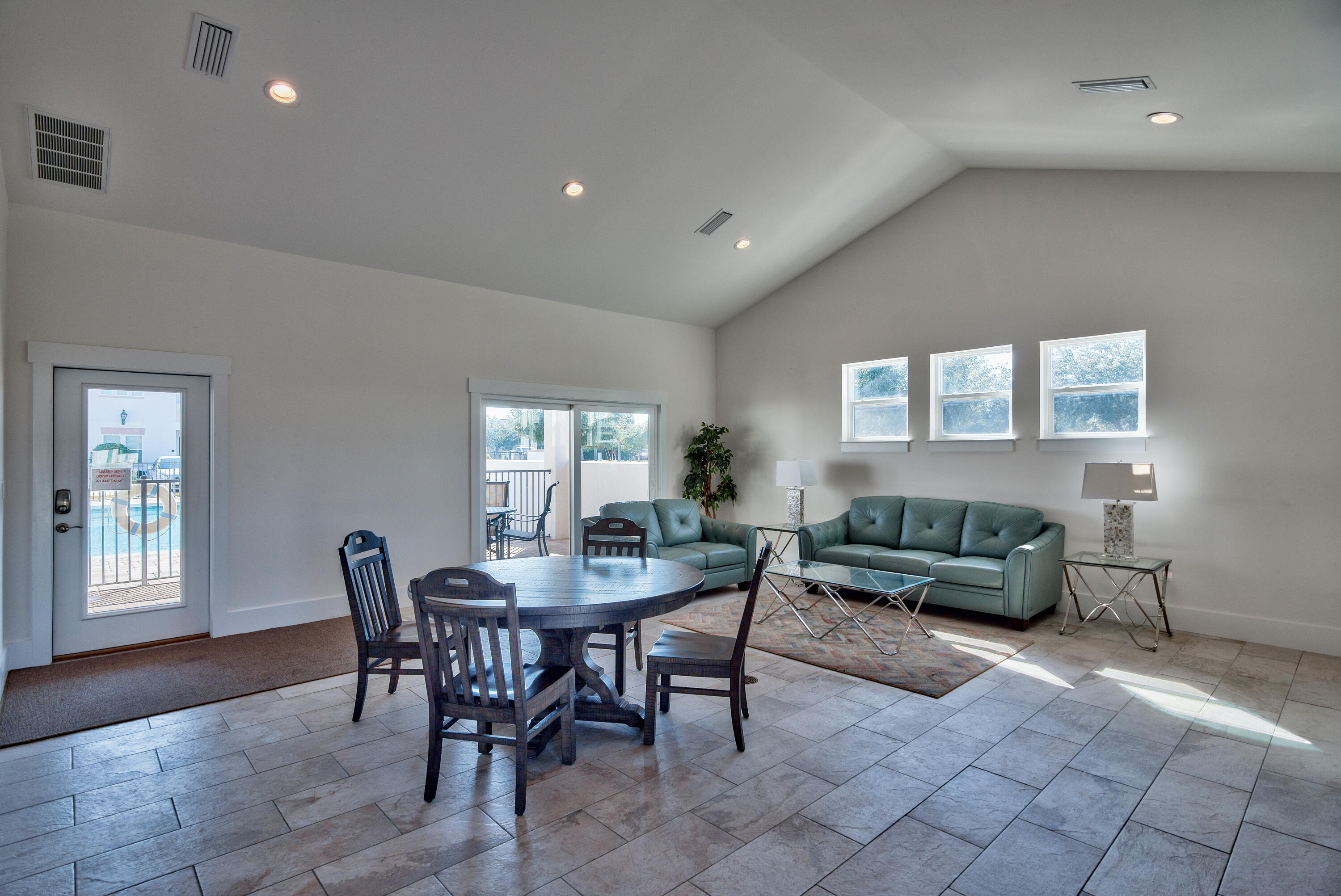 995 Airport Road, Unit 13 Destin, FL 32541 - Photo 29 of 34 a view of a dining room with furniture and window