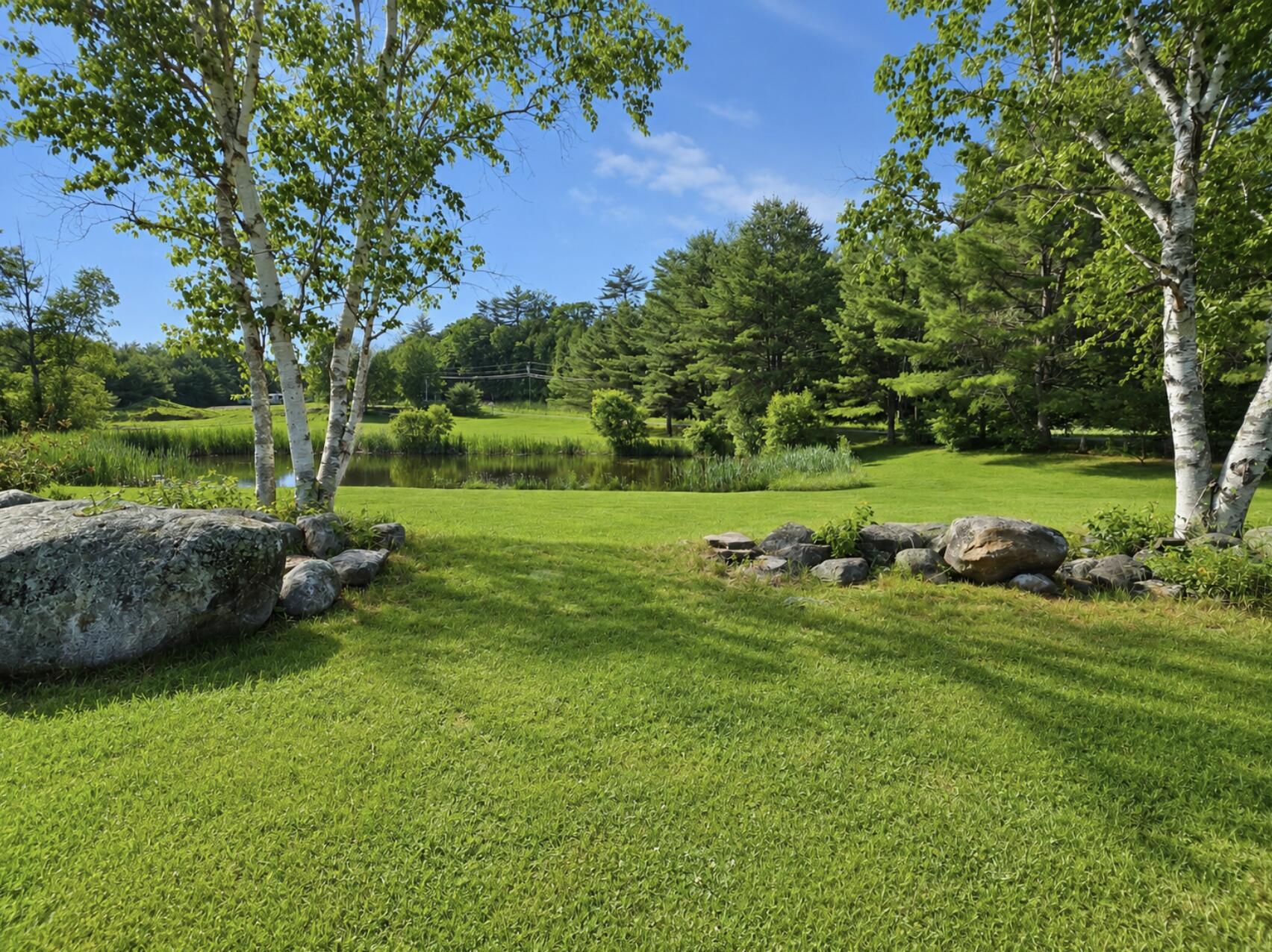 1010 Oakland Road Belgrade, ME 04917 - Photo 5 of 22 Landscaped Backyard Views
