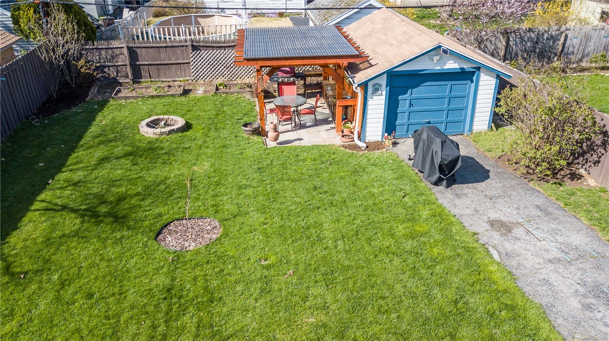 108 Garford Road Irondequoit, NY 14622 - Photo 4 of 50 Detached 1 car garage, and beautiful stained pergo
