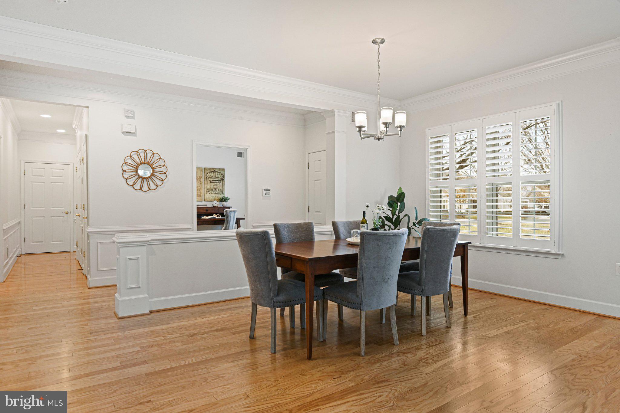 44482 Maltese Falcon Square Ashburn, VA 20147 - Photo 10 of 71 a view of a a dining room with furniture window and wooden floor