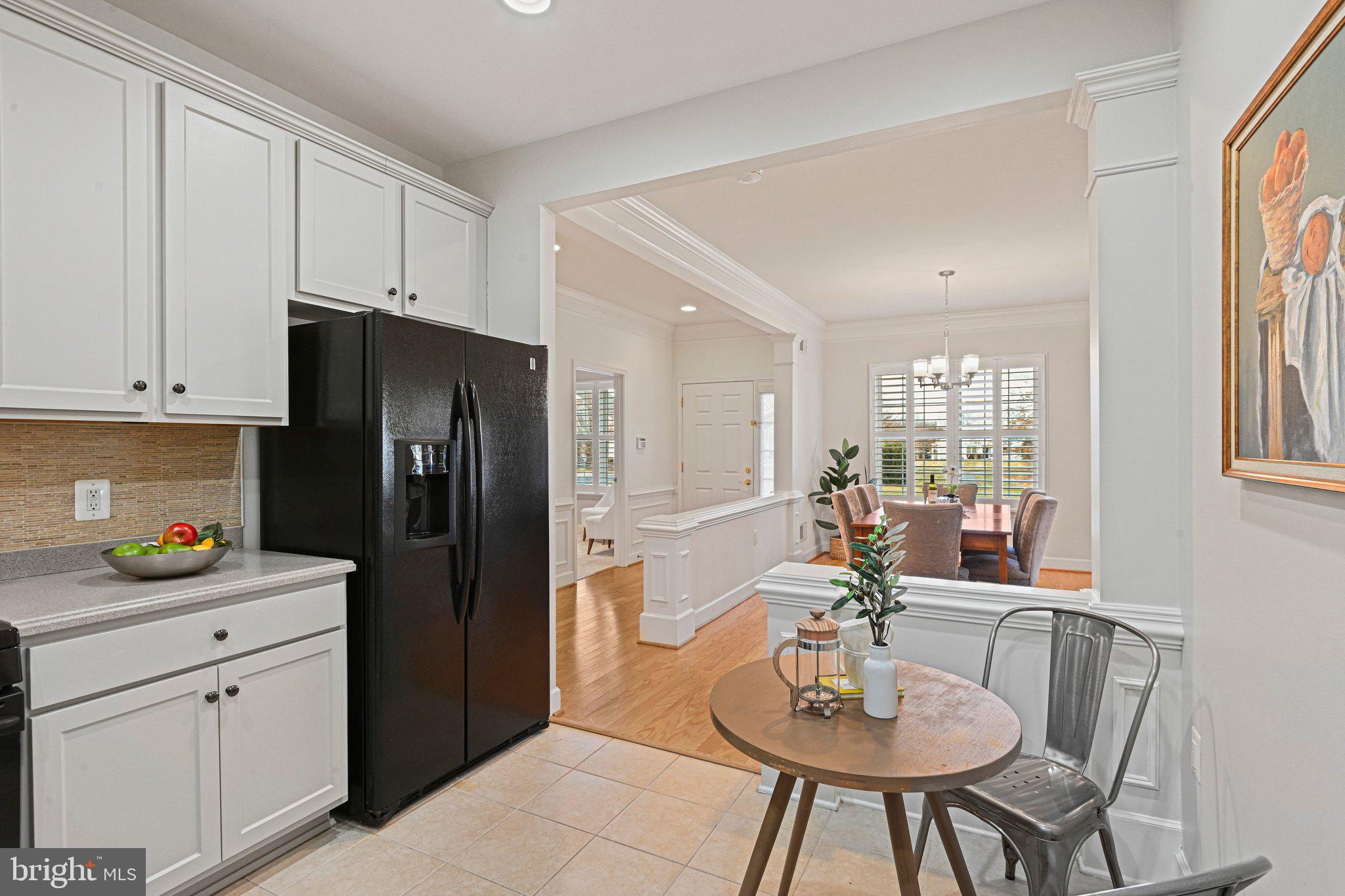 44482 Maltese Falcon Square Ashburn, VA 20147 - Photo 13 of 71 a kitchen with stainless steel appliances a refrigerator and a sink